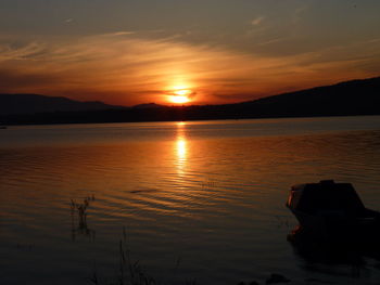 Scenic view of sunset over river