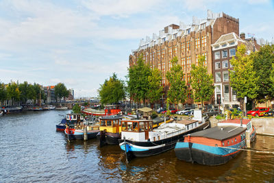 Boats moored in canal