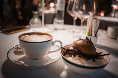 Close-up of cappuccino on table