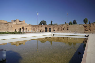 El badii palace with the pool or water fountain in the arena