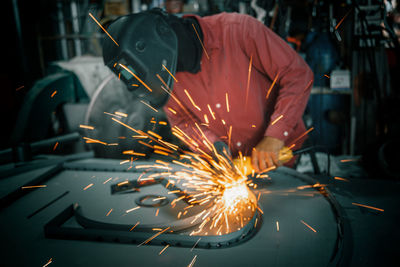 Man working on metal