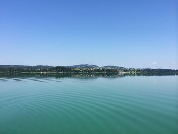 Scenic view of calm sea against clear sky