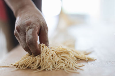 Close-up of person preparing food