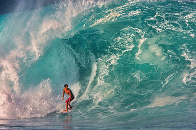 Man surfing in sea