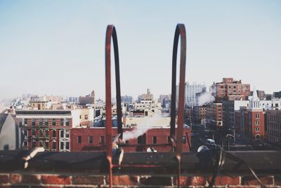 Cityscape against clear sky