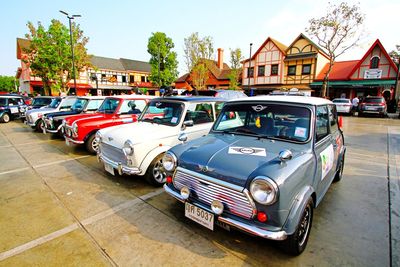 View of cars on street in city