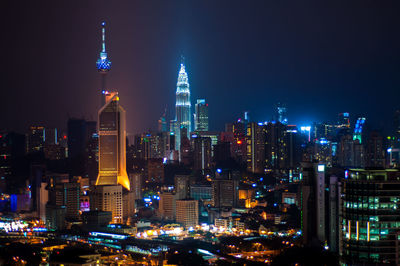 Illuminated cityscape at night