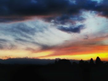 Scenic view of dramatic sky during sunset