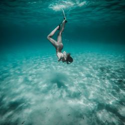 Man swimming in sea