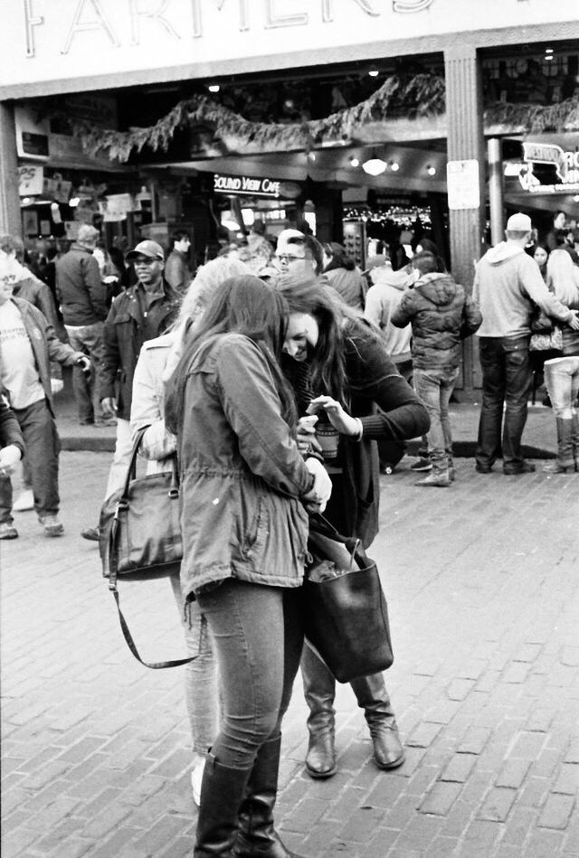 men, lifestyles, person, large group of people, casual clothing, leisure activity, walking, street, full length, city life, standing, rear view, market, medium group of people, togetherness, city, shopping, retail, market stall