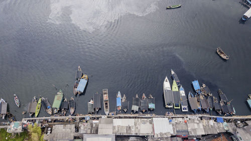 High angle view of commercial dock against sea