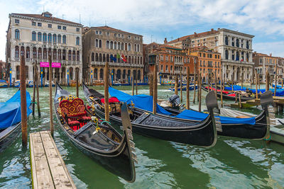 Boats moored in canal