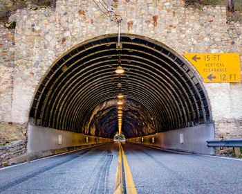 Road leading towards tunnel