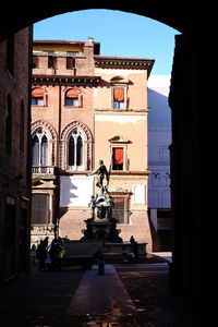 Statue of historic building against clear sky