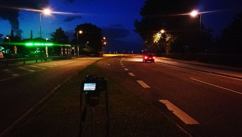 Cars on road at night