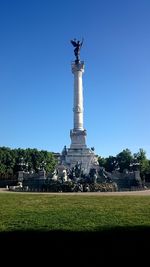 Low angle view of eiffel tower against clear sky