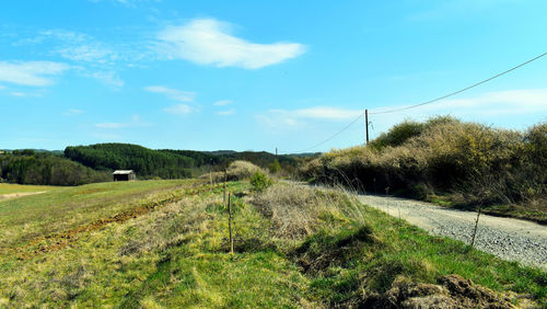 Scenic view of land against sky