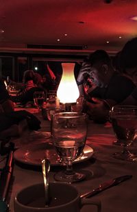 Close-up of wine glasses on table at restaurant