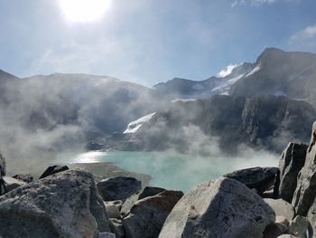 Panoramic view of rocky mountains against sky