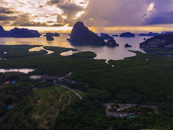 Aerial view phang nga bay at sunrise with mangrove tree forest and hills in the andaman sea