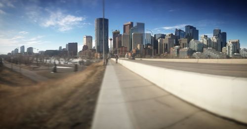 Modern buildings in city against sky