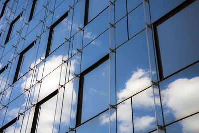 Low angle view of skyscraper against sky