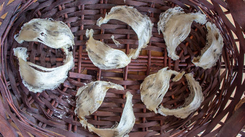 High angle view of ice cream in basket on table