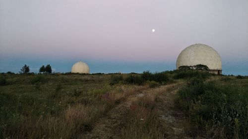 Scenic view of field against clear sky