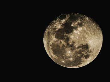 Scenic view of moon against black sky