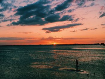 View of calm sea at sunset