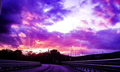 Scenic view of landscape against cloudy sky