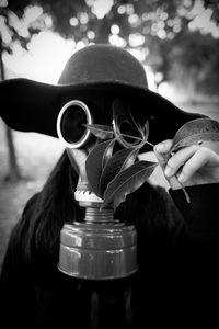 Close-up of woman in gas mask