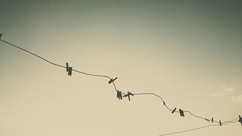 Low angle view of power lines