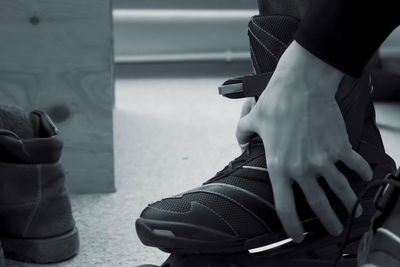 Low section of women sitting on floor