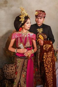 Portrait of a couple in indonesian traditional clothes 