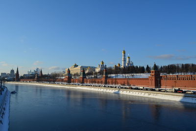 River by city against clear sky