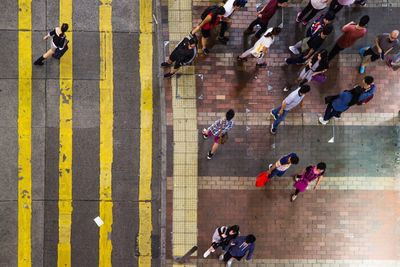 High angle view of people on zebra crossing