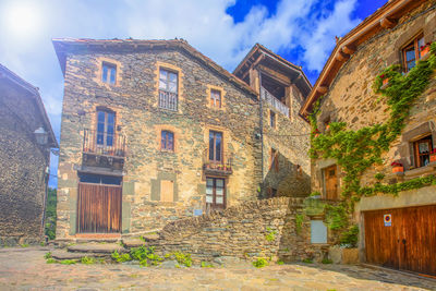 Old street with stone houses, france