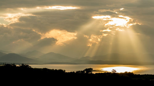 Scenic view of silhouette landscape against sky during sunset