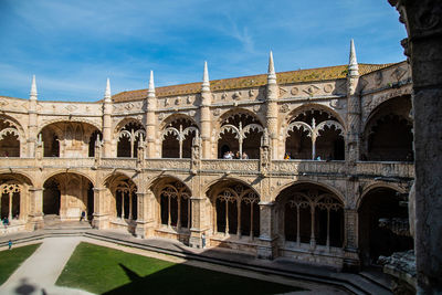 Facade of historic building against sky