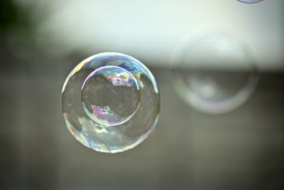 Close-up of bubbles in drinking glass
