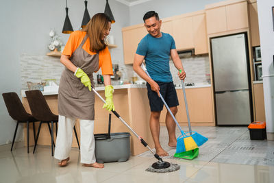 Rear view of man working at home