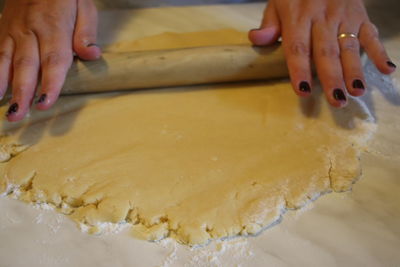 Midsection of person preparing food