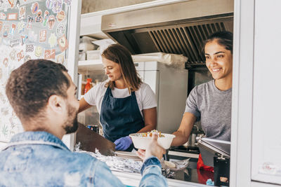 Group of people having food