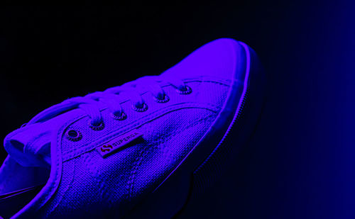 High angle view of shoes over black background