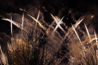 Close-up of firework display at night