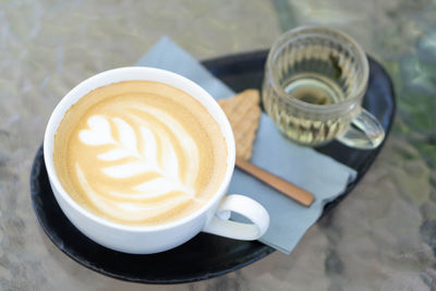 High angle view of cappuccino on table