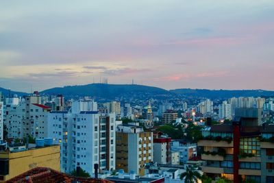 High angle view of buildings in city against sky