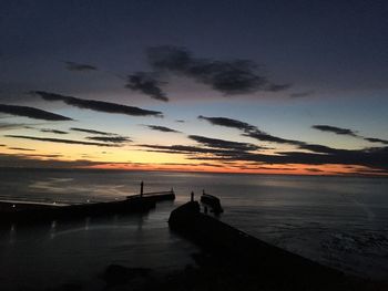Silhouette of people on beach