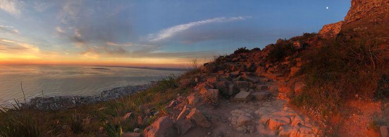 Scenic view of sea against sky at sunset